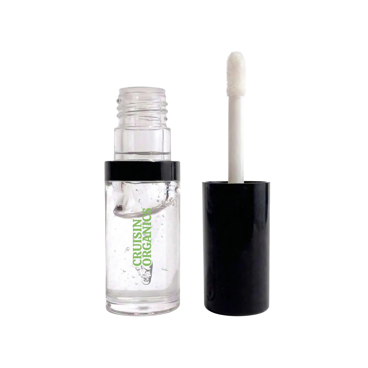A clear cosmetic bottle with a black cap and applicator wand, shown open on a plain white background. The bottle label reads &