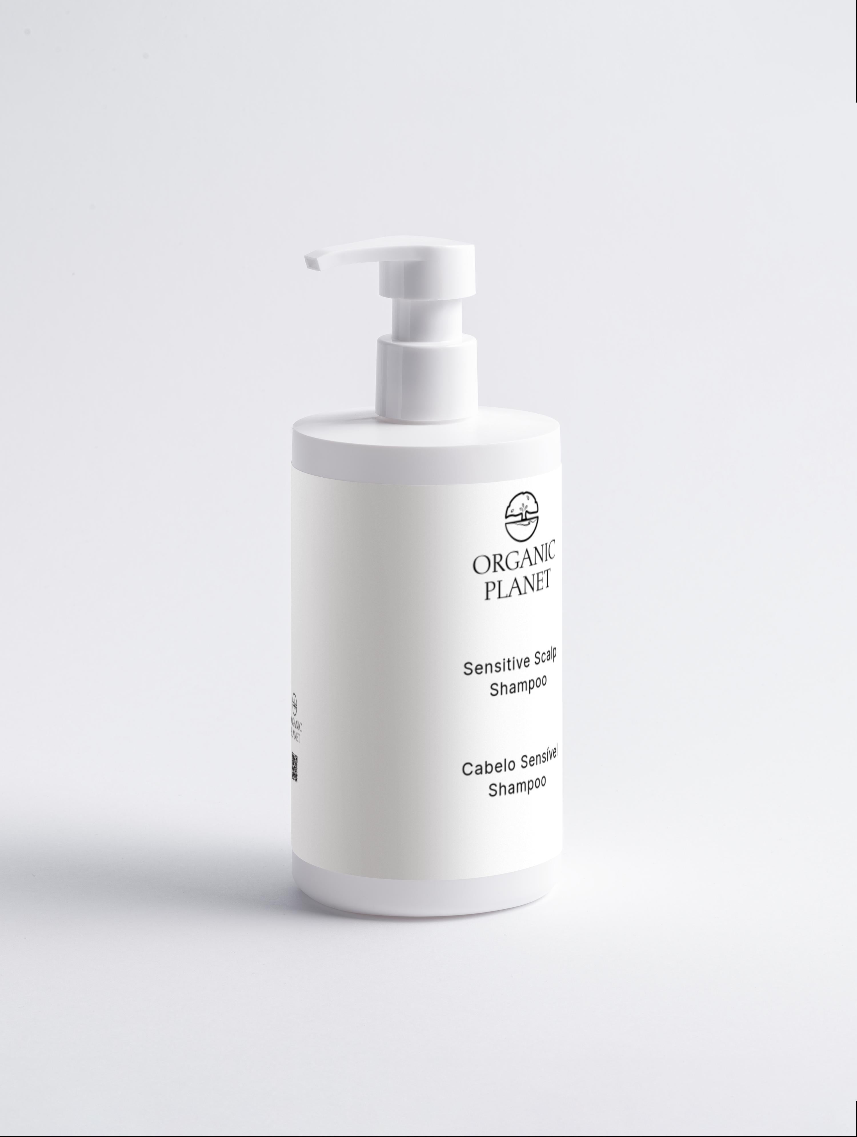 White shampoo bottle with pump labeled &