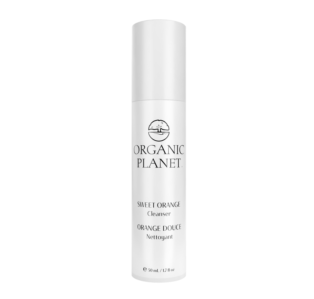 Experience the refreshing power of the Sweet Orange Cleanser, enriched with certified organic camu camu, amla, and citrus essences. This gentle formula delivers antioxidants and vitamin C to nourish your skin while its light foam effectively. removes impurities without stripping moisture. Reveal a clean, balanced complexion that feels revitalized and naturally radiant every day. White bottle of Organic Planet Sweet Orange Cleanser on a white background. Sold on Amazon
