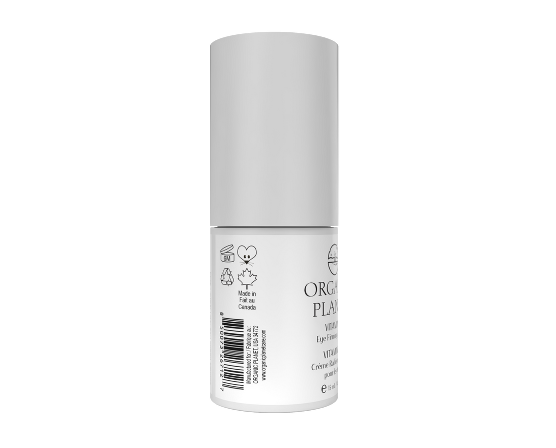 White cylindrical container with a label on a white background. Enriched with Organic and plant - based ingredients. Vitamin C Eye Firming Cream