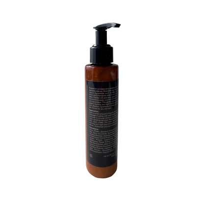Brown pump bottle with vertical Cruisin Organics branding ingredient list, white background.