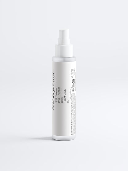 Close up of the lightweight, transparent spray mist formula of the Keratin Gloss Leave-In Hair Mist.