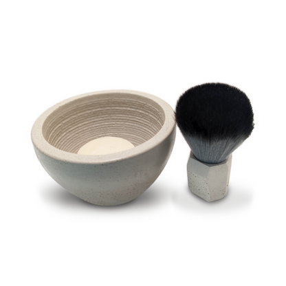 Indulge in a warm, luxurious lather with our Ivory Shaving Bowl Bundle. Handcrafted with organic materials by Cruisin Organics, this concrete bowl features intricate grooves for a rich lather and has been expertly coated for durability. Use with our artisanal shaving soaps and brushes for a premium shaving experience.