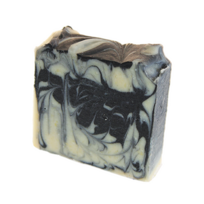 Experience a nourishing deep clean with our goat milk and charcoal face soap. Made with farm-fresh ingredients, this powerful blend is perfect for balancing and revitalizing oily skin. Our goat milk provides fatty acids and nutrients for strong, plump skin, while activated charcoal draws out impurities and unclogs pores for a clearer complexion.