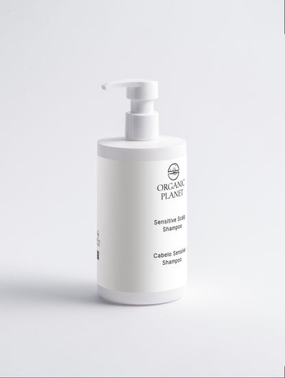 White shampoo bottle with pump labeled &
