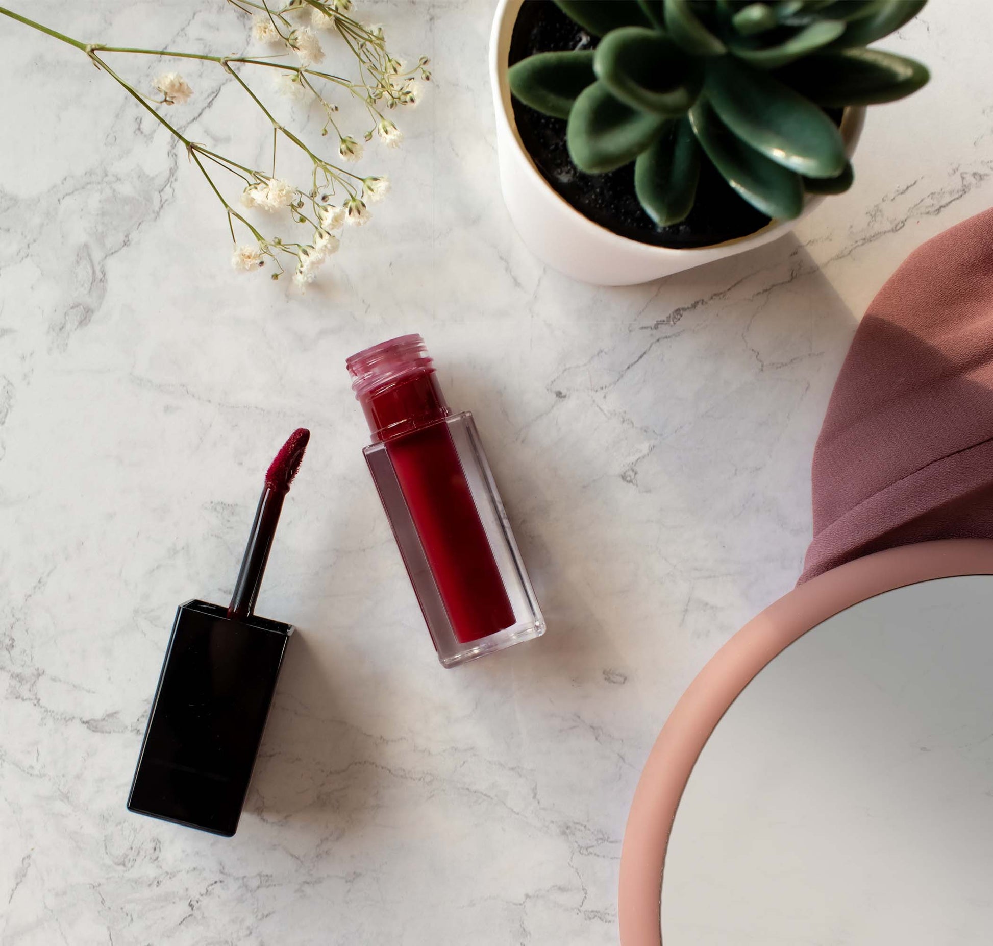 Blackberry Wine Matte Lip Stain by Cruisin Organics is the perfect choice for a long-lasting, bold look. Our formula is enriched with vitamin E and offers a silky matte finish for precision application and intense color.