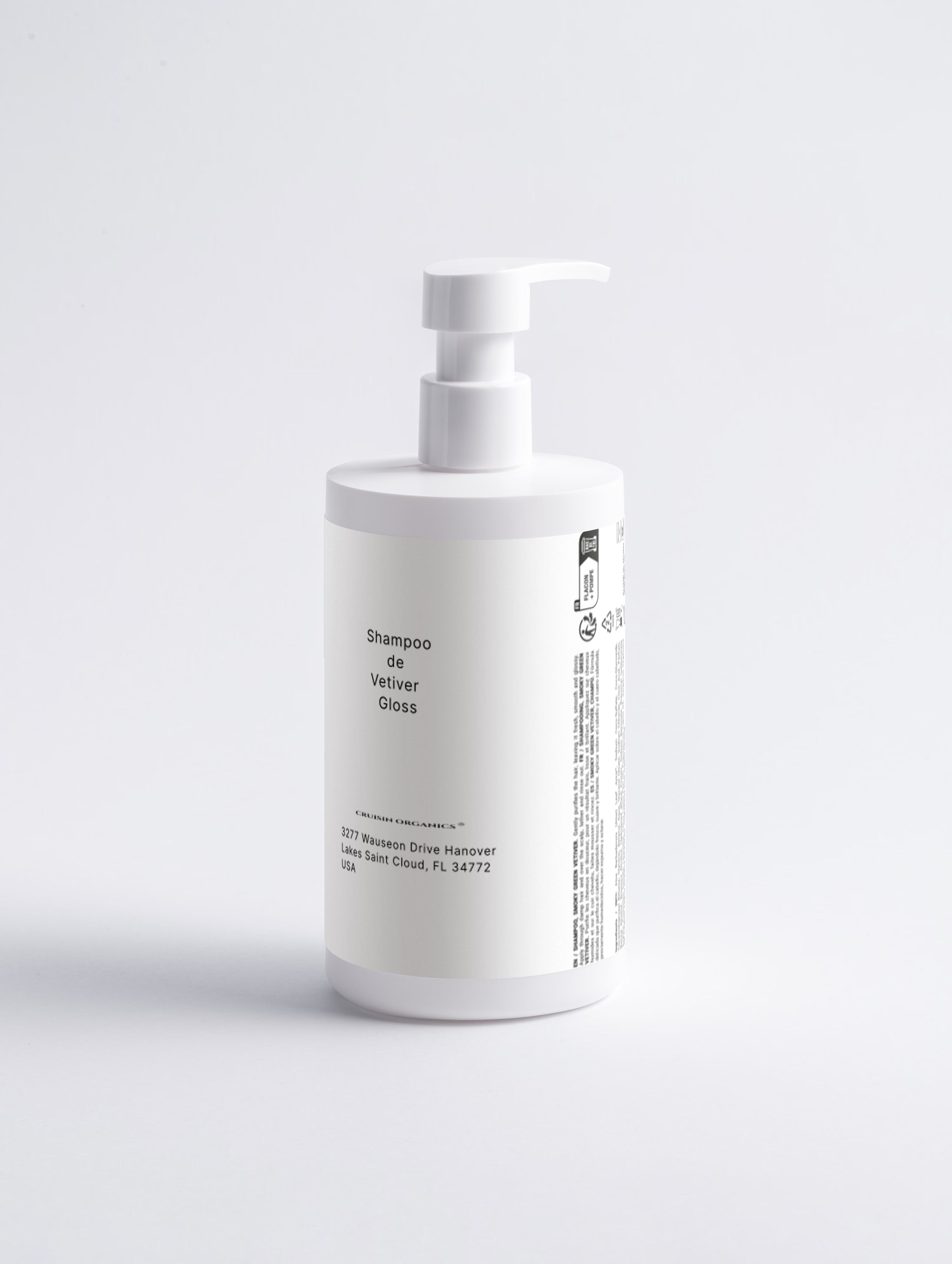 White bottle with pump dispenser on a light gray background