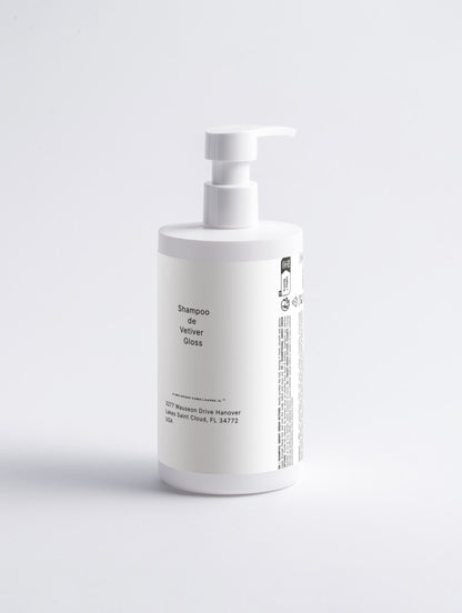 White bottle with pump dispenser on a light gray background