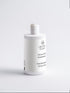 White bottle of Organic Planet Citrus Fresh Conditioner on a light gray background. This conditioner nourishes and protects hair ends, reducing breakage and split ends. It helps hair feel silky, adds volume, and makes styling easier. Suitable for all hair types, it features a refreshing Citrus Cocktail.