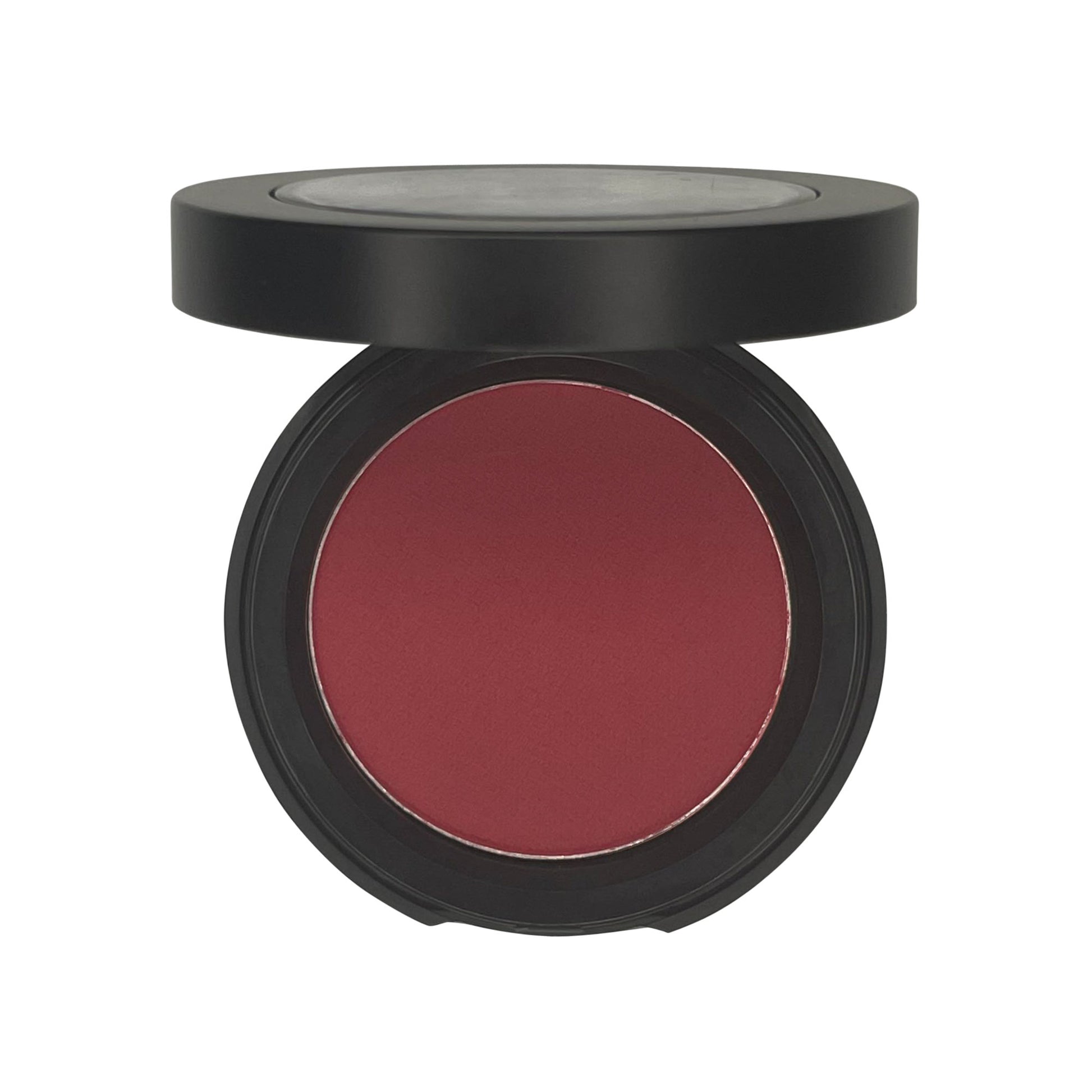 Cruisin Organics' Raspberry Single Pan Blush. Formulated without talc, this soft pressed powder effortlessly blends for a flawless finish. Add a refreshing pop of color to your cheeks with ease.