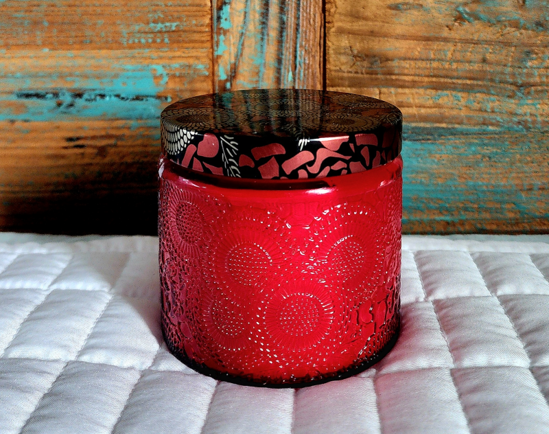 Candle Elegance custom-made soy candle with premium ingredients and organic essential oils. Comes in a reusable, colorful jar that can be used for decoration, in the office, or as a gift for anyone. No chemicals used.