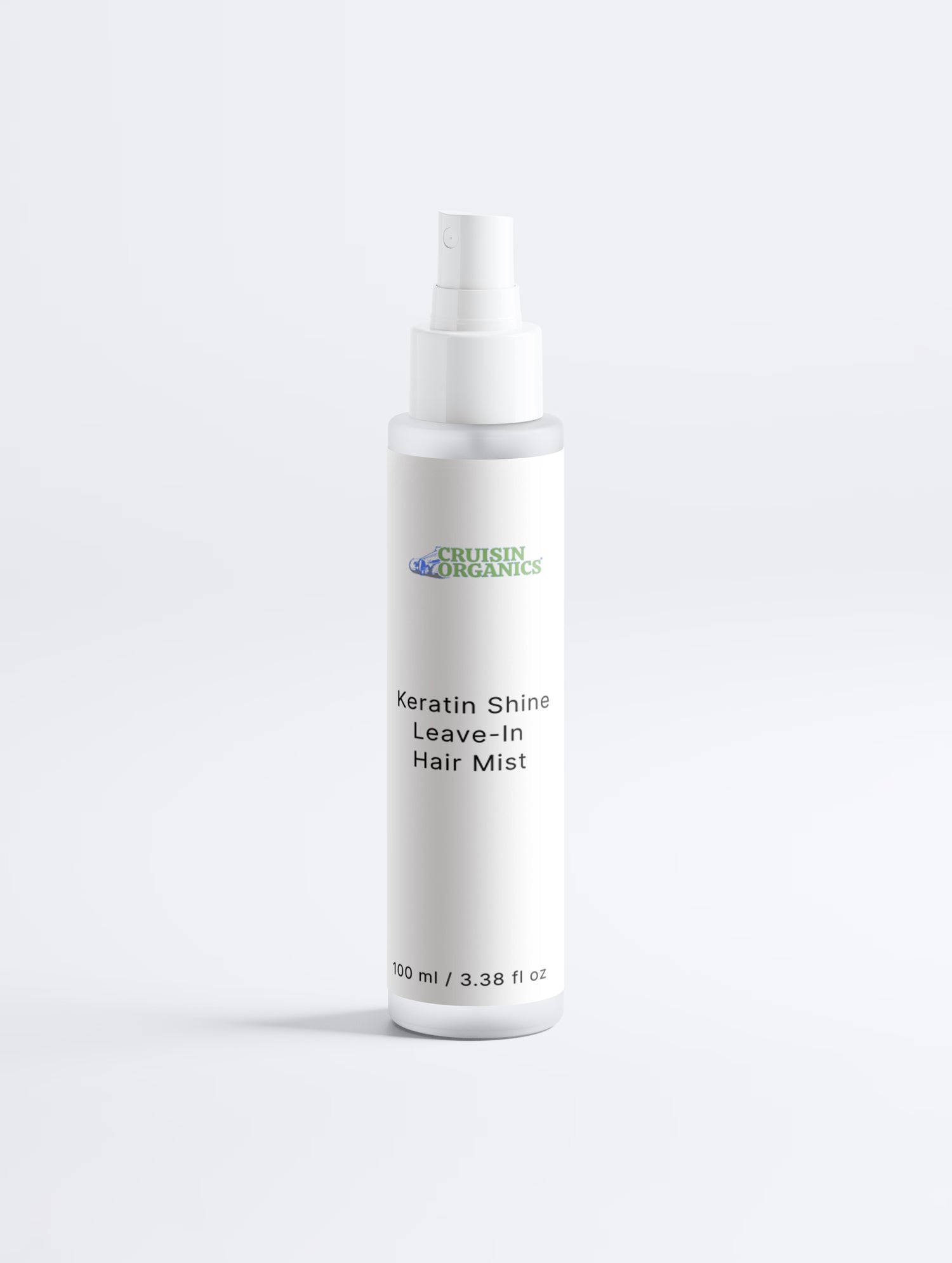 Cruisin Organics Keratin Gloss Leave-In Hair Mist in a clean, transparent spray bottle showing a professional-grade hair care design.