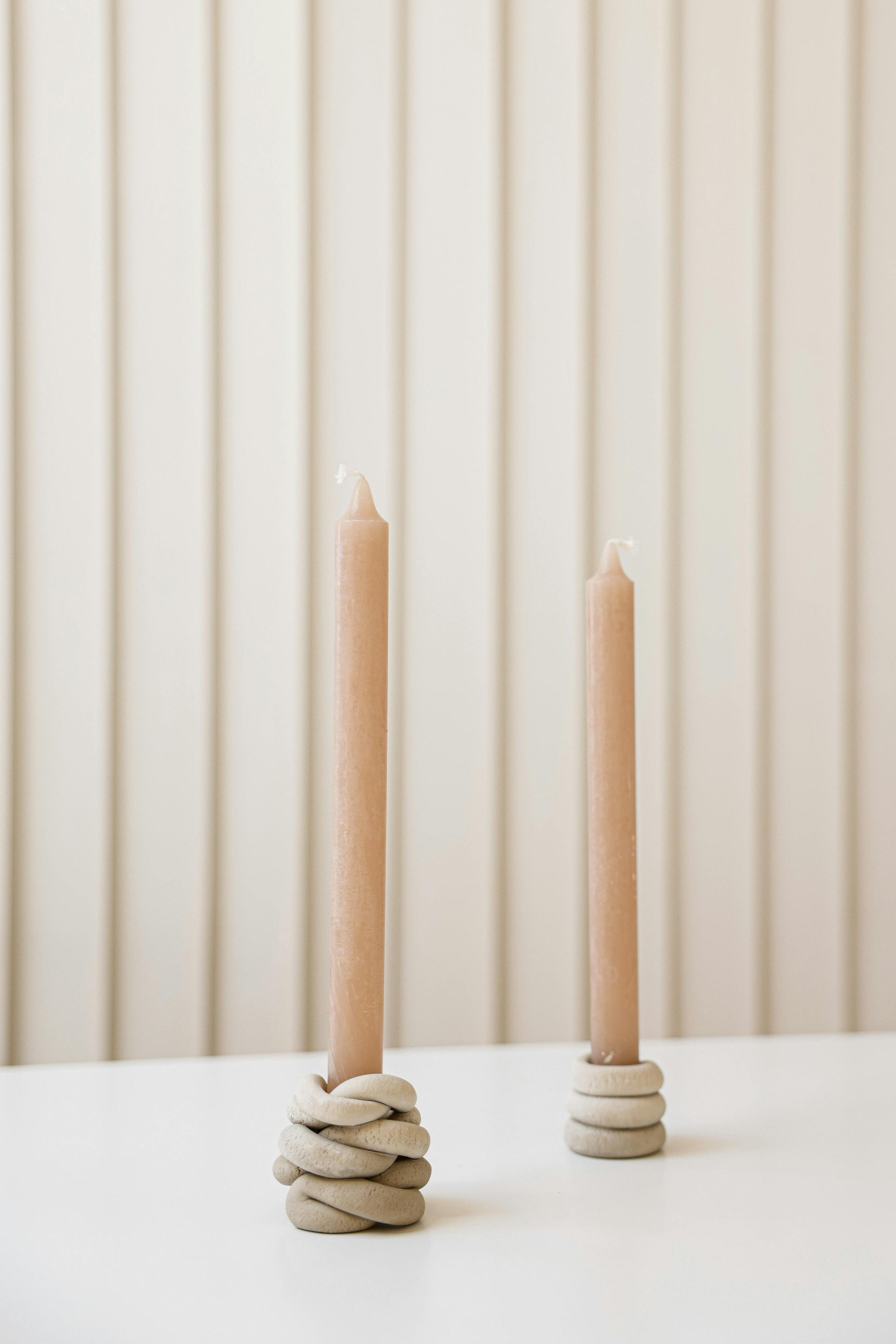 Elegant Taper Candles for Candles. To produce the purest burning candle experience possible, each lovingly created candle is made from cotton and beeswax that are obtained responsibly in the USA, eco-consciously colored, and devoid of artificial smell.