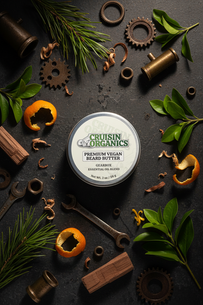 Cruisin Organics Gearbox Beard Butter in a rugged industrial botanical flat-lay