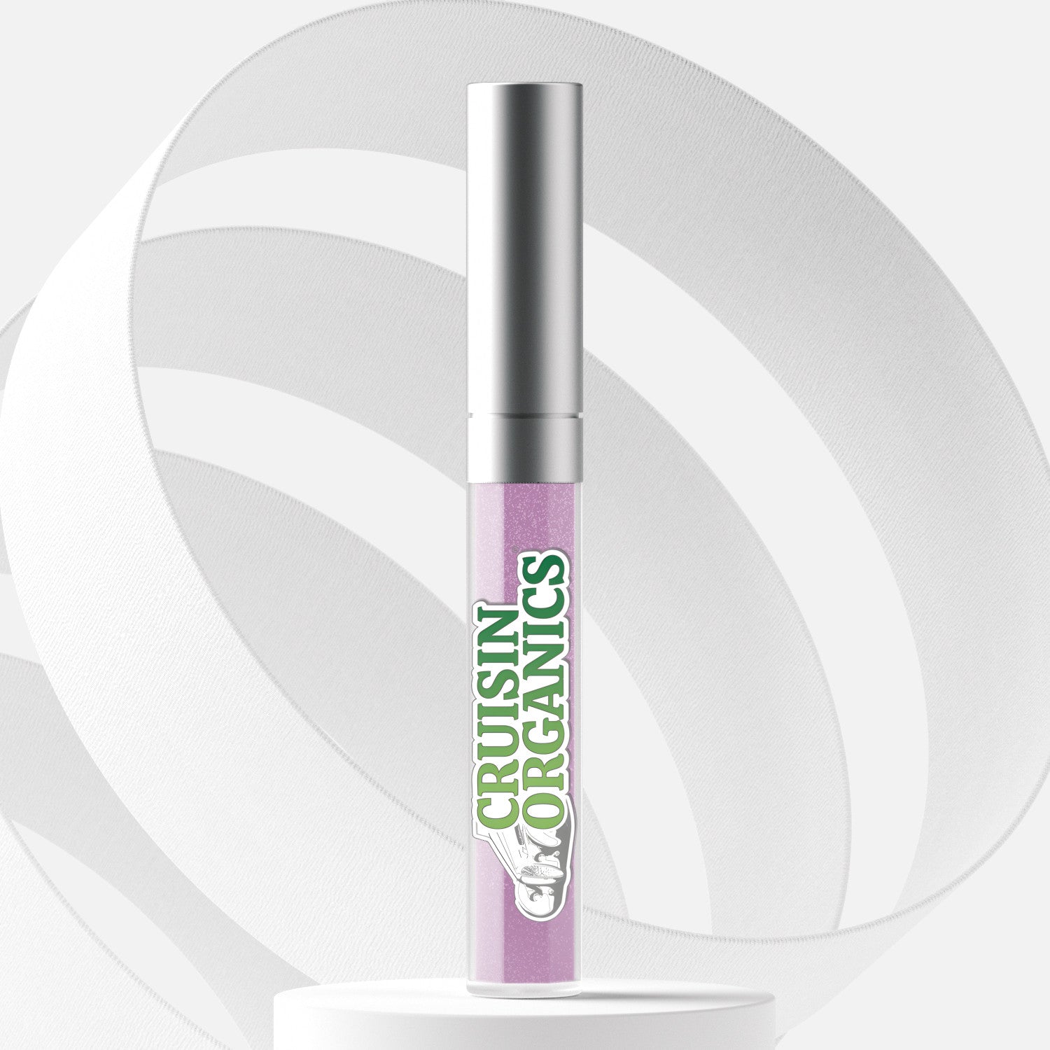 Cruisin Organics Angelic Lilac Holographic Lip Gloss. With a dazzling array of kaleidoscopic pearls, this galactic gloss adds a celestial aura to your lips. Not only is it vegan, cruelty-free, gluten-free, and paraben-free, but it also nourishes and softens your lips. Wear it alone or layer it for a mesmerizing multi-dimensional finish. Shine on, exclusive individual.