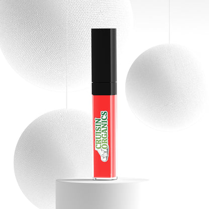 Daytime Lip Gloss by Cruisin Organics in a peachy coral color. Vegan and Cruelty-Free.